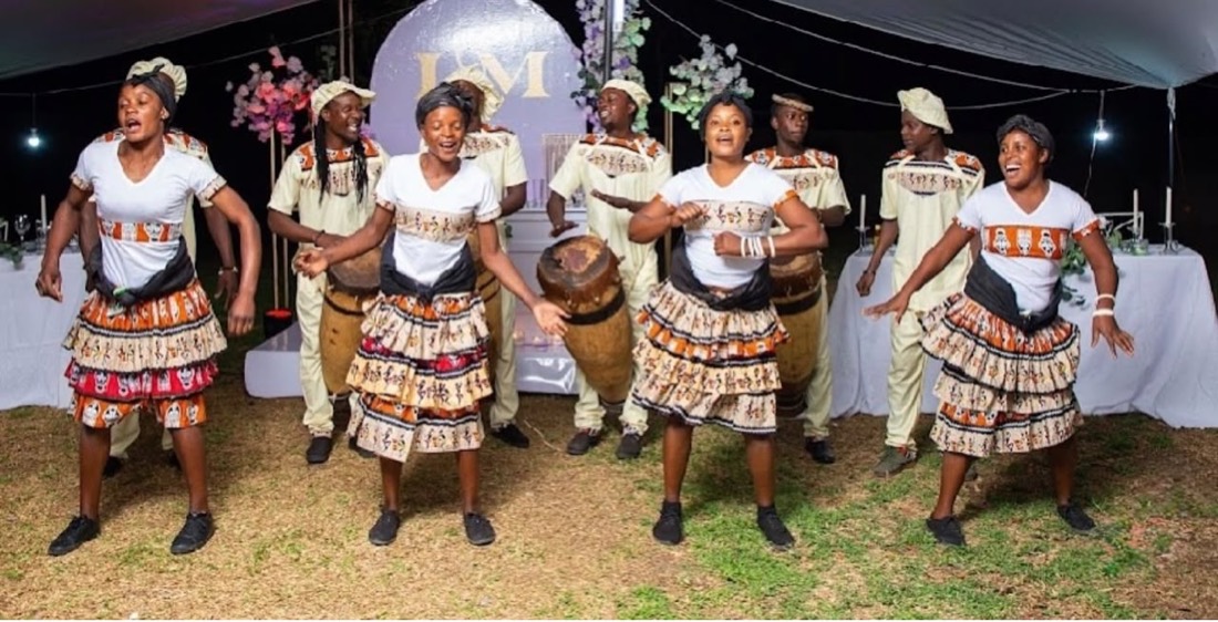 Traditional dancers in Zambian dress with drums