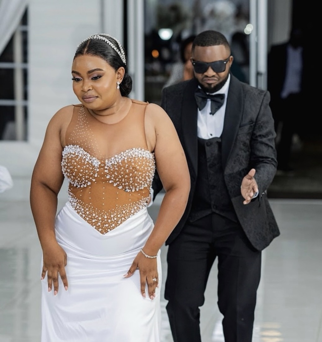 Bride and groom entering the reception