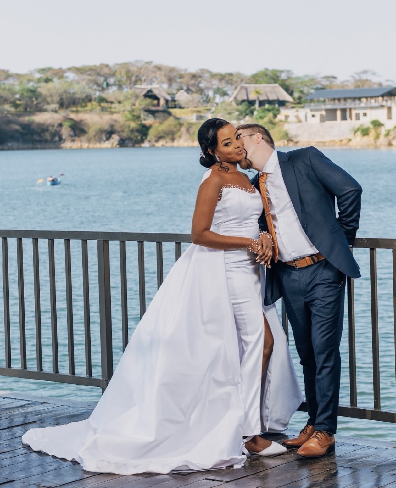 A couple by the water at a Haven Luxe celebration